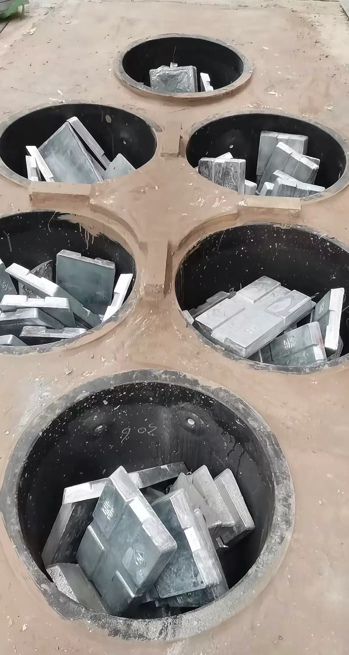 Multiple crucibles loaded in furnace for batch melting